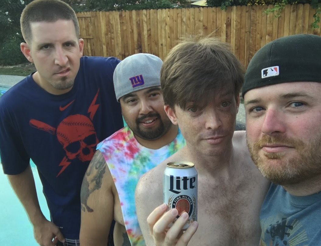 Hustle crew by the pool with beers
